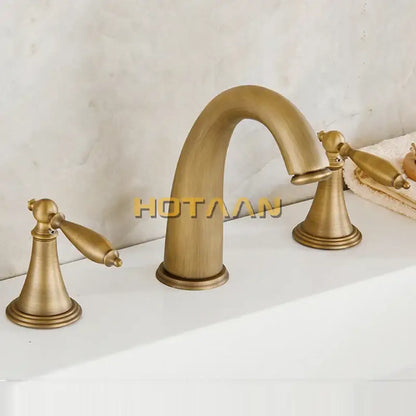 DecorBites antique brass bath mixer set with three ornate handles and curved spout in brass finish
