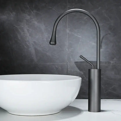 Decorbites™ antique brass bathroom basin faucet with modern matte black finish, sleek curved spout, and cylindrical base