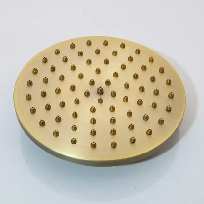 Decorbites antique brass bathroom shower set featuring a brass-colored circular showerhead with grid nozzles