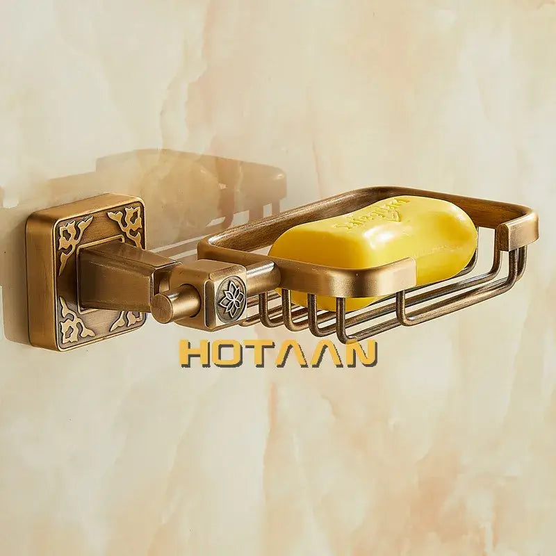 DecorBites™ antique brass soap dish holder wall mounted with ornate square bracket and wire mesh basket holding yellow soap