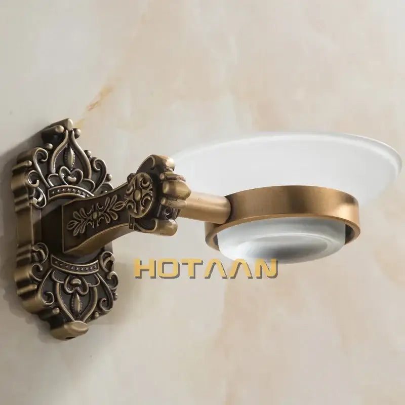 DecorBites antique brass bathroom wall-mounted soap dish with ornate scrollwork and clear glass bowl holder