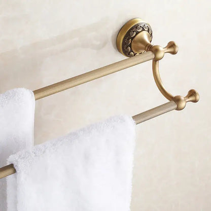 DecorBites™ antique brass double towel bar with ornate circular wall mount and polished finish bathroom towel rack