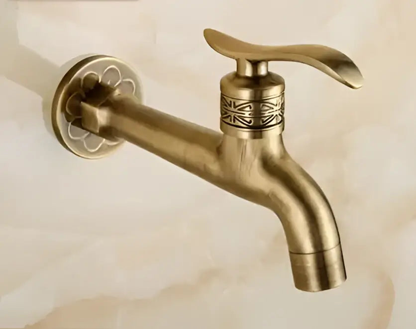 Decorbites antique brass dragon outdoor washing machine faucet with ornate floral and geometric detailing