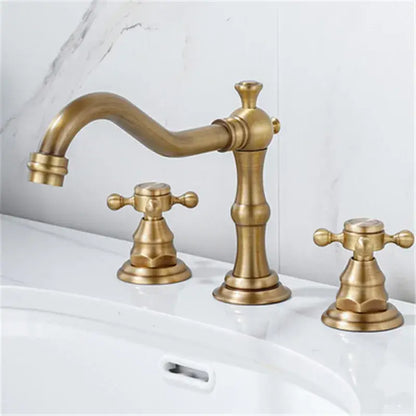 Decorbites antique brass gold bathroom basin faucet with three cross handles and ornate vintage brass gold design