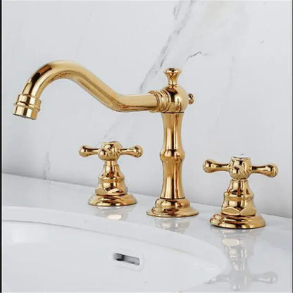 Decorbites antique brass gold basin faucet with three golden brass handles and curved spout for bathroom use