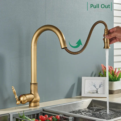 DecorBites™ antique brass kitchen faucet with brass finish, pull-out flexible hose, and vintage-style handle for sink use