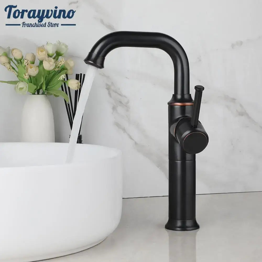 Decorbites™ black matte bathroom faucet with sleek curved spout single handle mixer tap in antique brass oil finish
