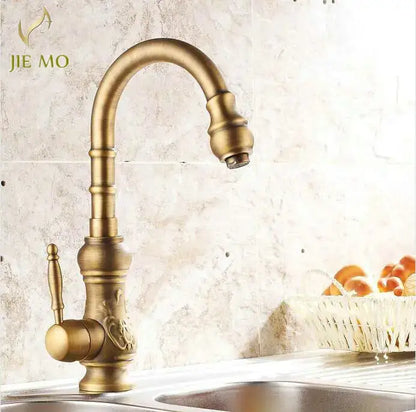 Decorbites™ antique brass porcelain basin mixer kitchen faucet with ornate detailing and 360 degree swivel spout
