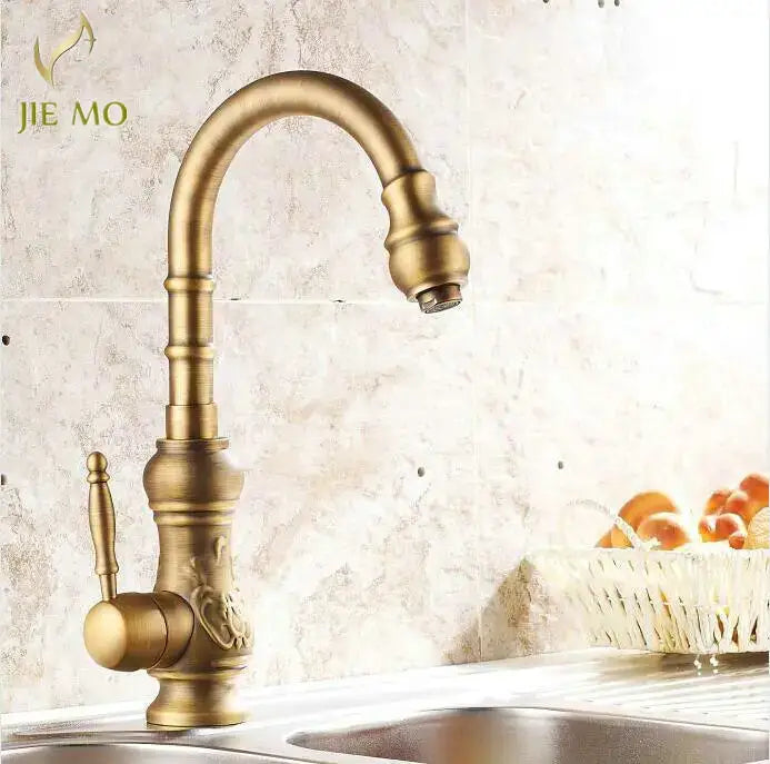 Decorbites™ antique brass porcelain basin mixer kitchen faucet with ornate detailing and 360 degree swivel spout