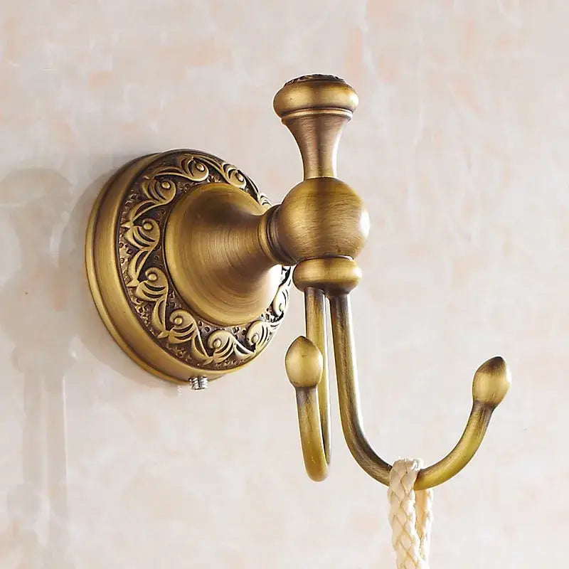 Antique brass robe hooks by decorbites featuring double hook design with ornate floral detailing and brushed finish