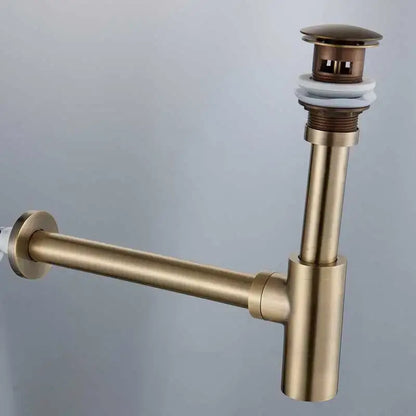 DecorBites™ antique brass bathroom sink drain pipe featuring a brass round siphon with white rubber gasket and modern design
