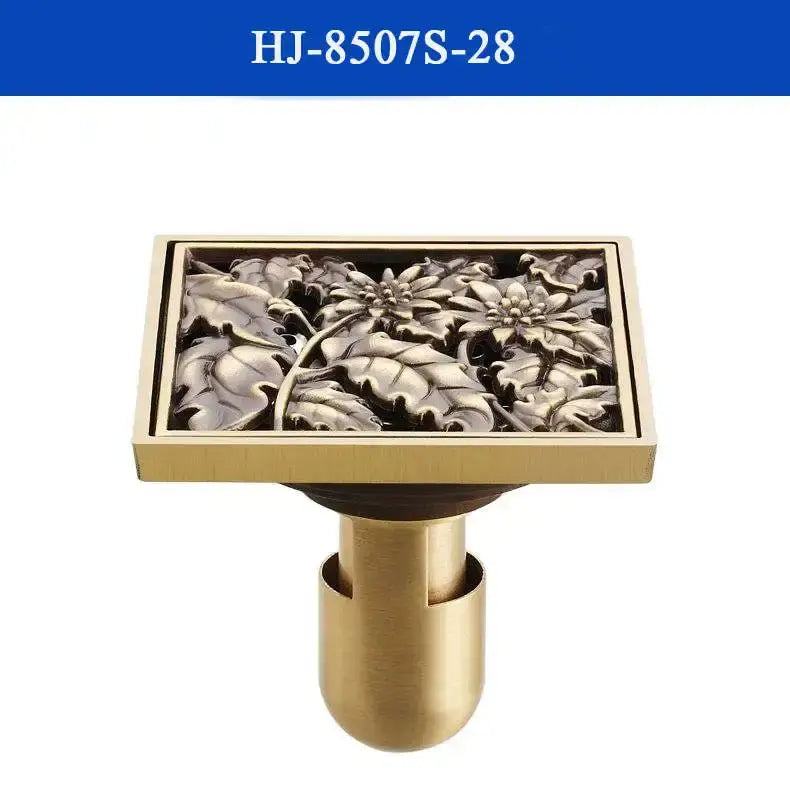 DecorBites antique brass shower drain cover with intricate floral relief design in brass for bathroom use