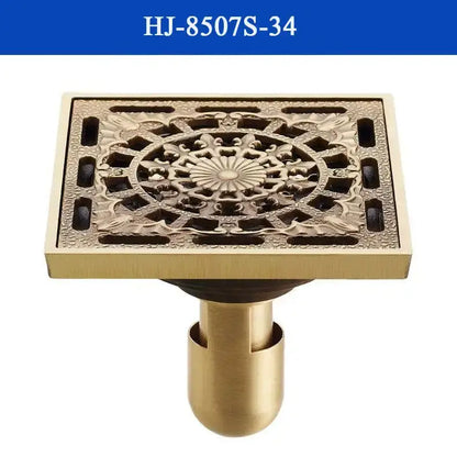 Decorbites antique brass shower drain cover with intricate floral and geometric patterns in brass shower drain design