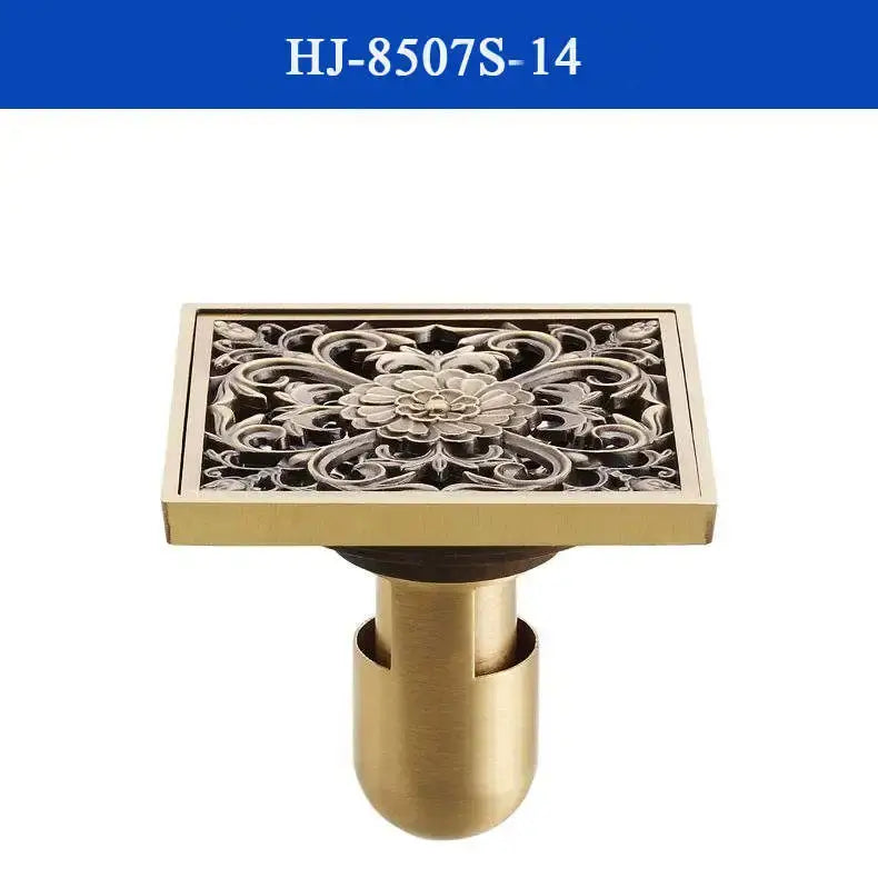 DecorBites antique brass shower drain cover with intricate floral and scrollwork design for bathroom use