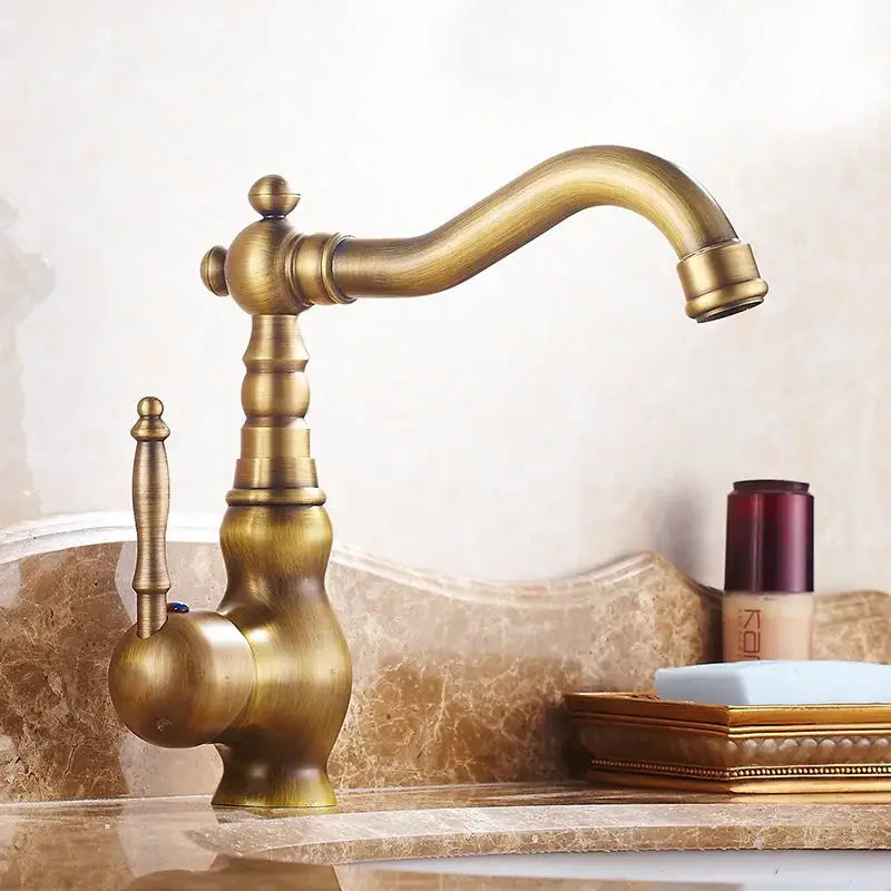 Antique brass single handle kitchen sink faucet by decorbites with ornate vintage design and curved spout mixer