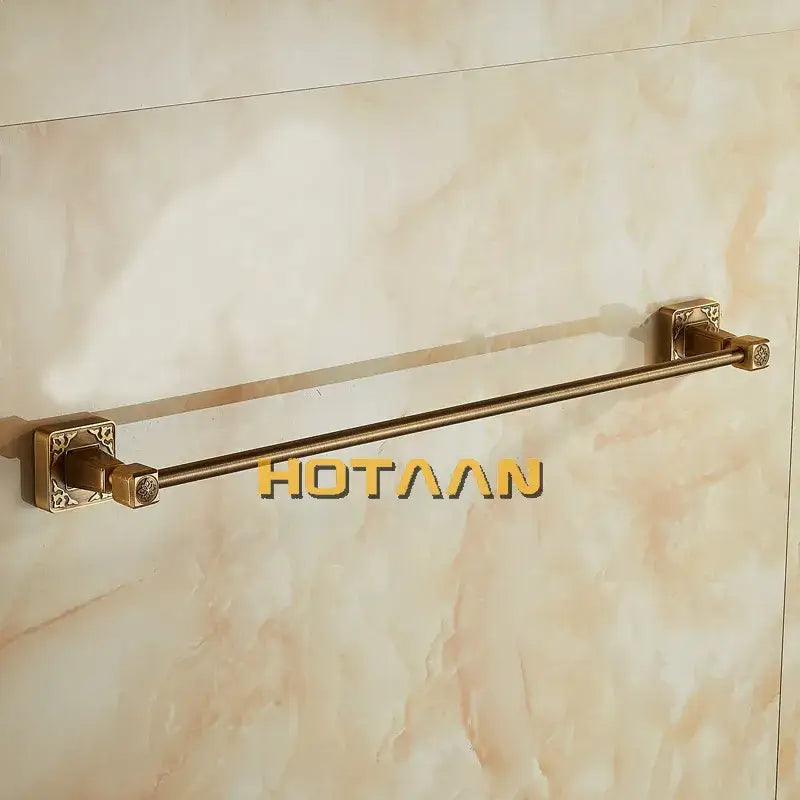 DecorBites antique brass single towel bar with ornate square wall mounts and polished rod for bathroom use