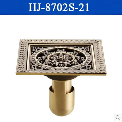 Decorbites™ antique brass square floor drain with intricate floral and geometric embossed design for shower floors
