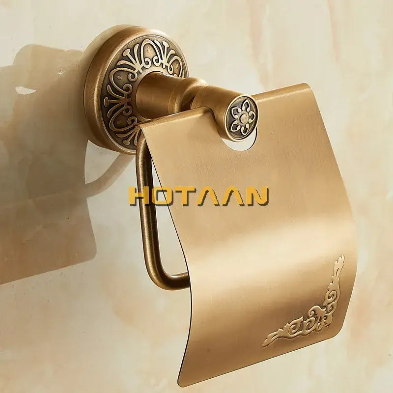 DecorBites antique brass toilet paper holder with ornate floral and scrollwork detailing for classic bathrooms