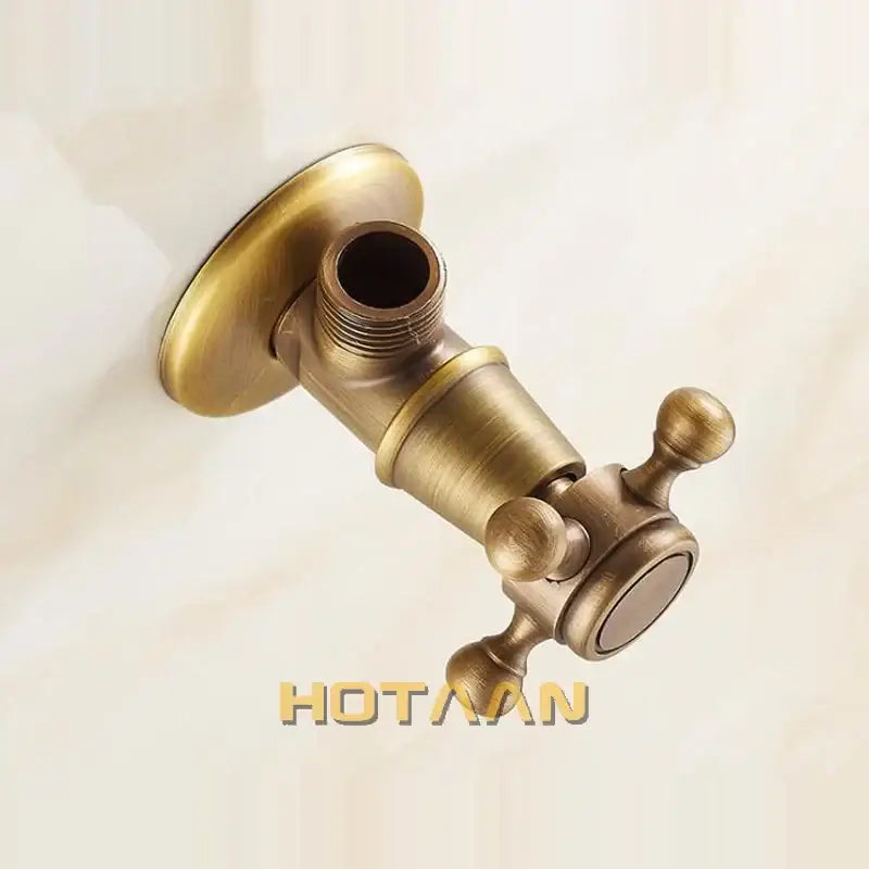 DecorBites antique brass triangle valve wall-mounted faucet with classic cross-handle for water control in bathroom