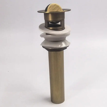 Decorbites antique brass vessel sink drain with cylindrical body and layered white rubber seals for bathroom use