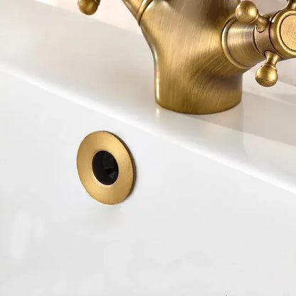 Decorbites antique brass vessel sink drain strainer with ornate brass faucet and matching circular drain cover