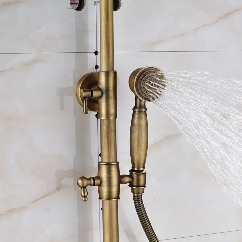 Decorbites antique brass wall mount dual handle shower faucet with handheld spray head and vertical rail in brass finish