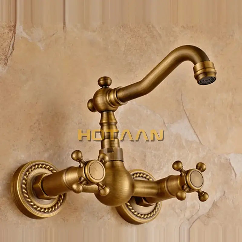 Decorbites antique brass wall mounted swivel kitchen faucet mixer tap with ornate twisted rope detailing and cross handles