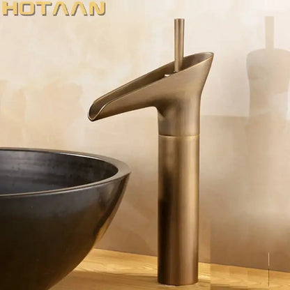 DecorBites antique brass waterfall basin faucet mixer tap with sleek modern design for bathroom sink use
