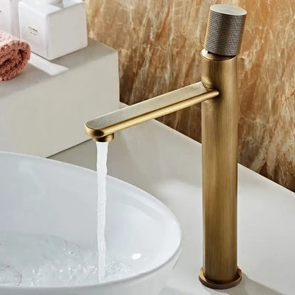 DecorBites™ antique bronze basin faucet with brass finish single-handle and knurled knob for hot and cold deck mounting