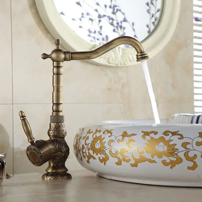DecorBites antique bronze basin faucet with single handle deck mounted mixer tap in antique brass finish and ornate design