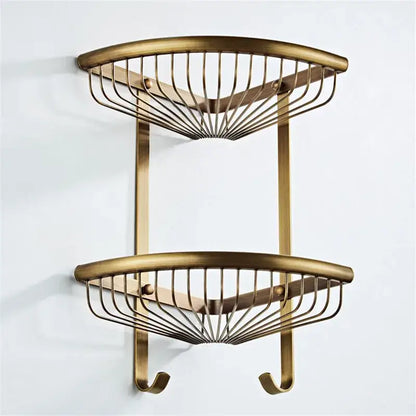 Brass double-tier corner shelf with curved wire mesh and hooks in antique bronze bathroom accessory set by decorbites