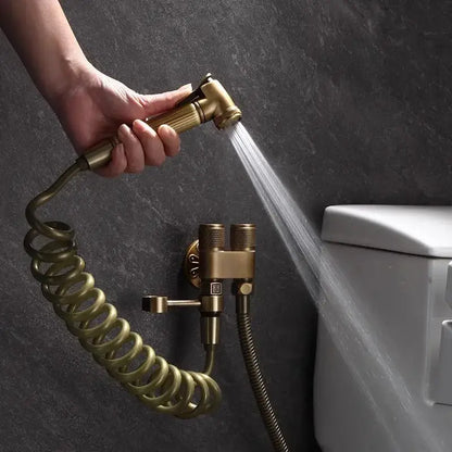 DecorBites™ antique bronze bidet sprayer set with brass handheld nozzle, coiled hose, and dual-handle wall mount