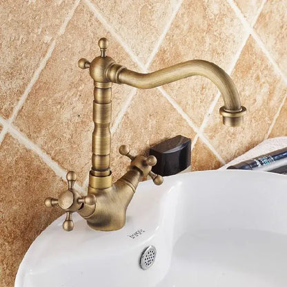 Decorbites antique bronze brass swivel basin faucet with curved spout and two lever handles in antique bronze finish