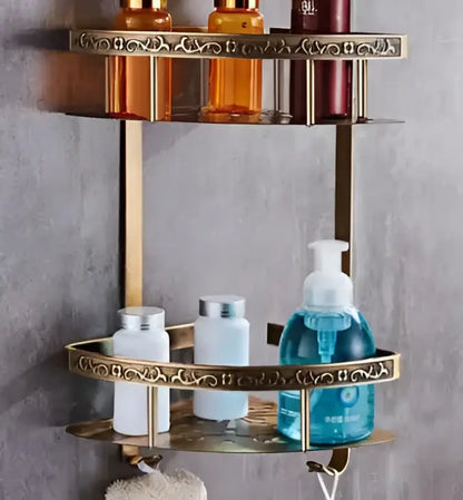 Gold-toned antique bronze carved double-tier bathroom shelf with ornate scrollwork edges in bronze carved aluminum