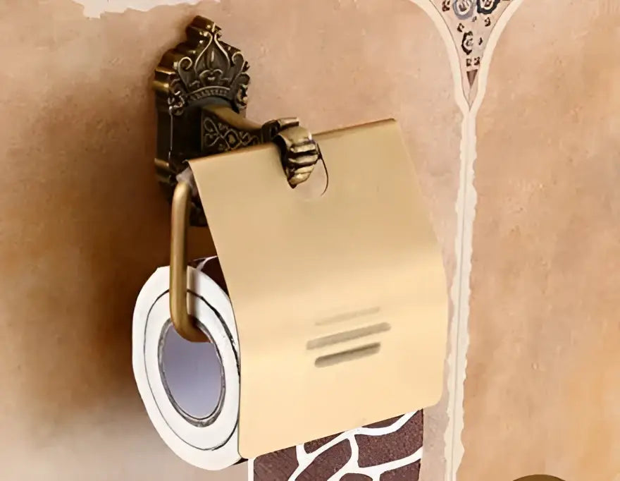 Antique bronze carved aluminum toilet paper holder with ornate vintage-style mounting and gold-toned cover
