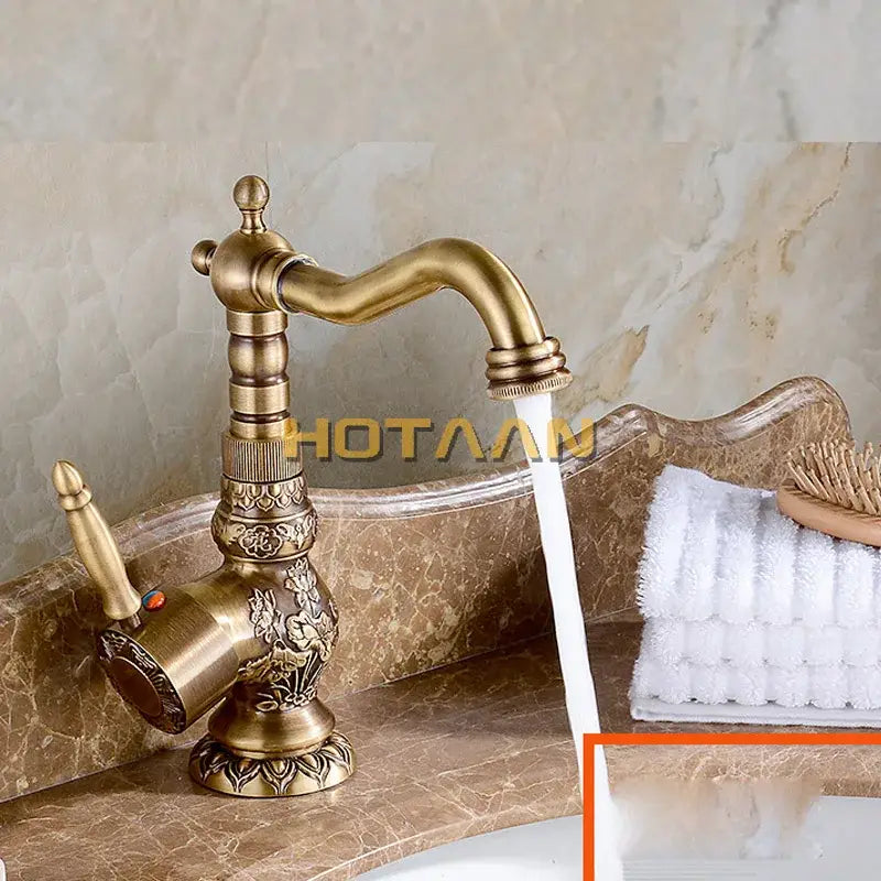 DecorBites antique bronze kitchen basin faucet with ornate floral engravings and curved spout for hot cold water mixing