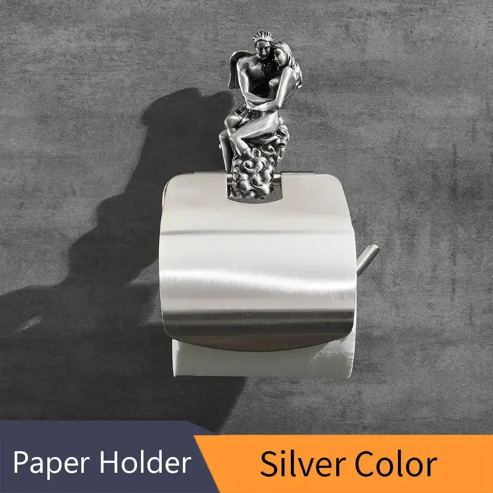 DecorBites™ silver metallic paper holder with ornate sculpted couple atop antique bronze wall mounted design