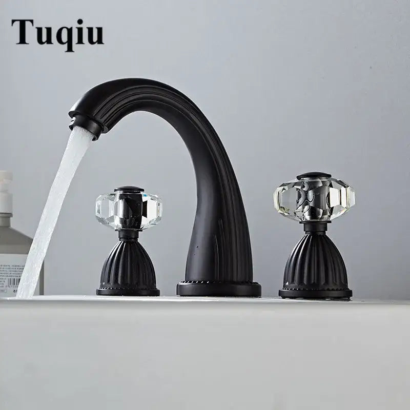 Decorbites™ antique bronze widespread basin faucet with black matte finish and crystal knob handles for hot and cold water