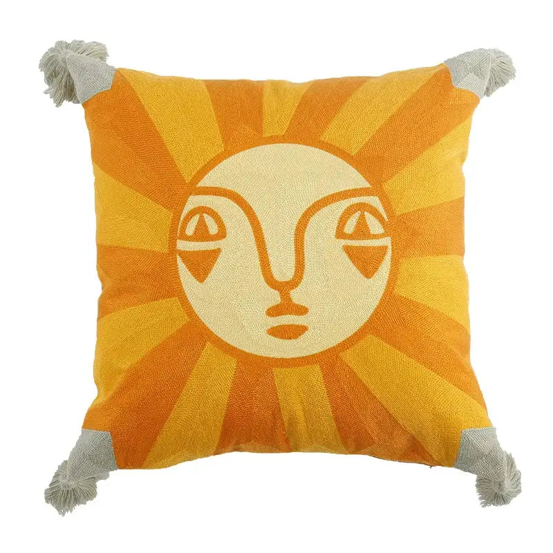 DecorBites™ pillow cover with orange and cream embroidered sun face and gray tassels in antique brown tiger print style