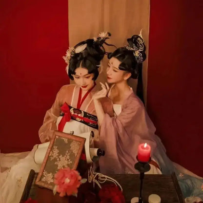 Two women in traditional hanfu with a solid wood foldable table by DecorBites for hanfu shoots and tea cooking