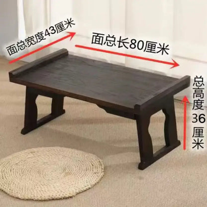 Dark brown solid wood foldable table with traditional design and sturdy legs for hanfu shoots and tea cooking