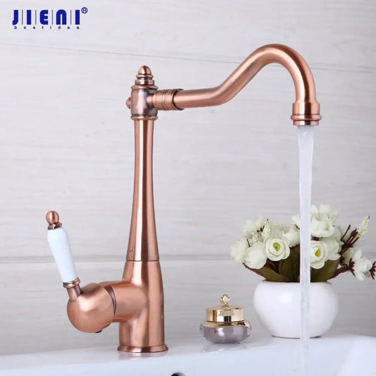 Decorbites™ antique copper basin mixer tap with copper finish and white ceramic handle in vintage design