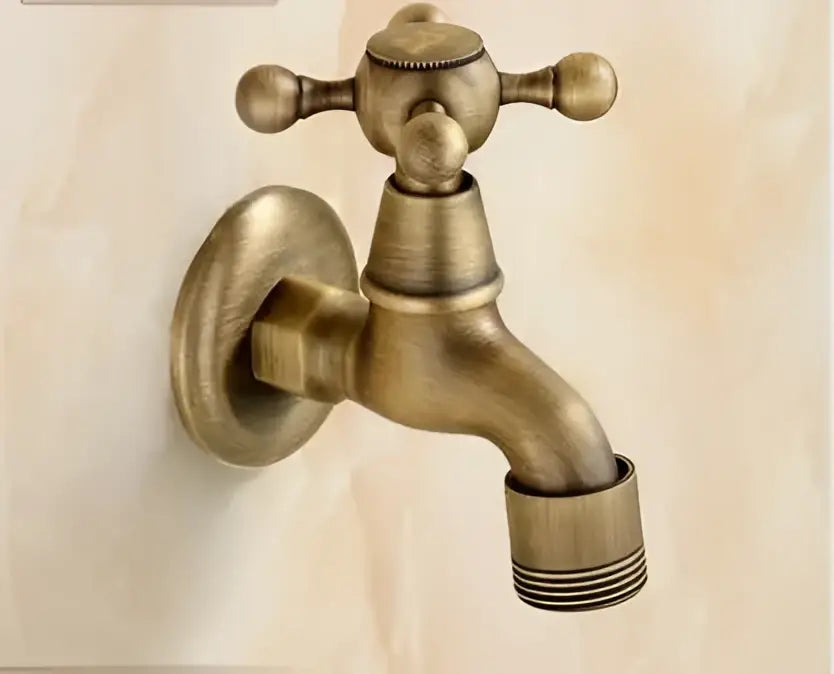 Antique brass garden bibcocks tap with cross-handle and threaded spout for outdoor washing and bathroom use