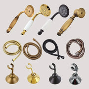 A collection of brass and black decorbites™ antique gold handheld shower heads with matching flexible hoses and wall brackets