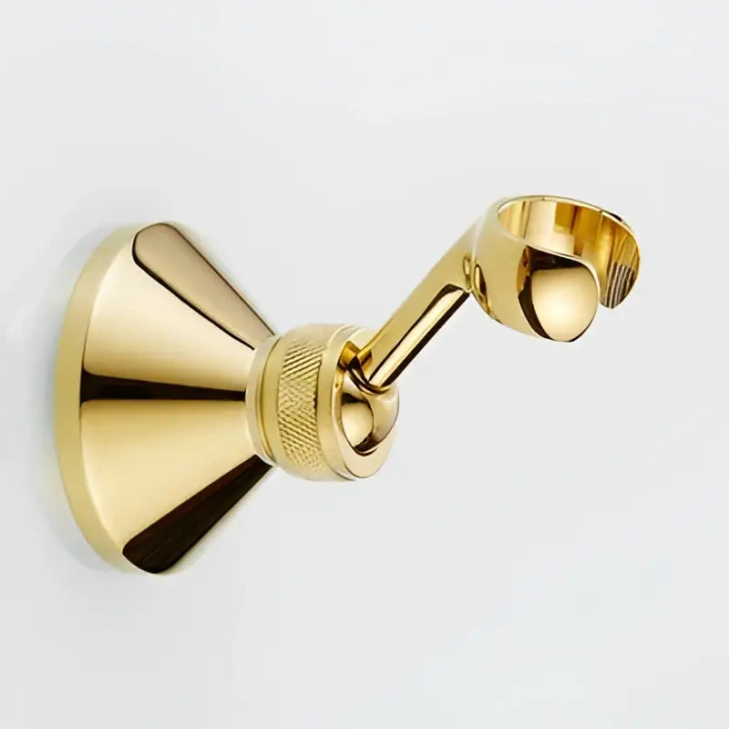 Gold-colored brass towel rack with polished finish complements decorbites™ antique gold handheld shower head set