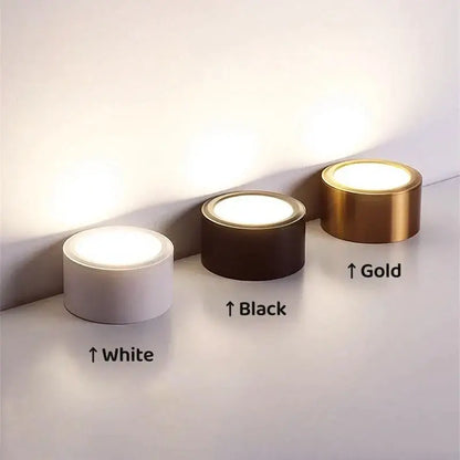 Three cylindrical led floor lamps in white black and gold finishes complement decorbites antique gold led ceiling downlights