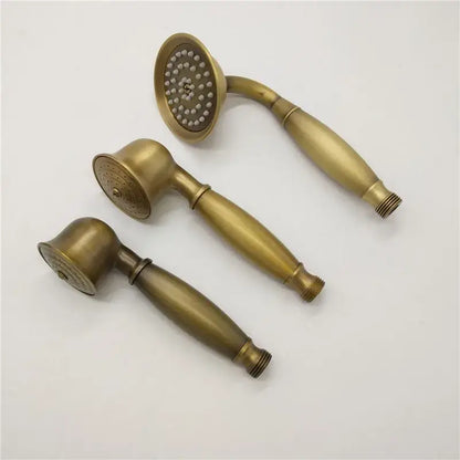 Three brass-finished decorbites antique handheld shower heads with varying nozzles and elongated handles for versatile use