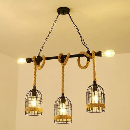 Decorbites antique iron hanging island light with three black metal birdcage shades wrapped in natural hemp rope