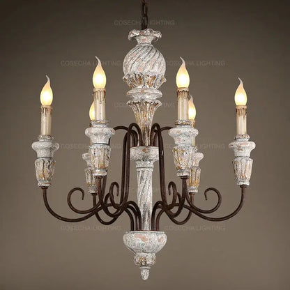 Decorbites antique white wooden chandelier with distressed white and gold finish ornate glass holders and wrought iron arms