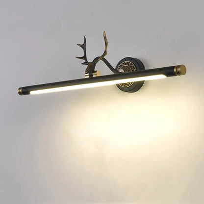 A sleek black and brass decorbites antler 8w led mirror light sconce for bedroom and bathroom wall mounting